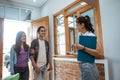 guesthouse staff welcoming couple in boutique hotel