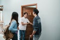 guesthouse staff welcoming couple in boutique hotel