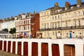 Guesthouses and beach huts, Weymouth. Royalty Free Stock Photo