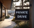 Guests are directed to an elegant abode in a quiet area by a private drive sign Royalty Free Stock Photo