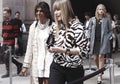 Guests street style arriving to a fashion show in New York