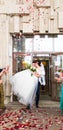 Guests Throwing Confetti Over Bride And Groom At Wedding Royalty Free Stock Photo