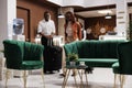 Guests waiting in hotel lounge area Royalty Free Stock Photo