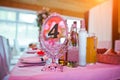 Guests wedding table with sign of number 4 mirror plate Royalty Free Stock Photo