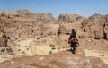 Guide on donkey. Passage to High Place of sacrifice. Petra. Jordan. Royalty Free Stock Photo