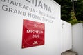 Guide Michelin logo in front of a restaurant recommended by the book in 2020 in Bled, Slovenia. Royalty Free Stock Photo