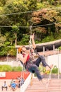 Guide Performs In Public A Climbing Rope Exercise