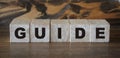 Guide Word Written In Wooden Cubes Royalty Free Stock Photo