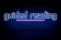Guided Reading - blue neon announcement signboard Royalty Free Stock Photo