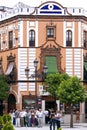 Guided tour tourists through center Seville, Spain