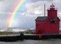 red lighthouse with rainbow Royalty Free Stock Photo