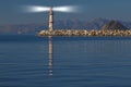 guiding and locator lighthouse with its light. very important for sea navigation. There is free space for writing. copy space. Royalty Free Stock Photo