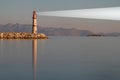 guiding and locator lighthouse with its light. very important for sea navigation. There is free space for writing. copy space. Royalty Free Stock Photo