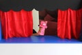 Guignol theater cultural and educational children`s activity tells a story in a small replica of a theater with puppets or glove d Royalty Free Stock Photo