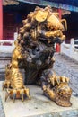 Guilded Imperial guardian lion in famous Forbidden City Beijing Royalty Free Stock Photo