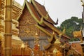 Guilded temple buildings at Wat Doi Suthep. Royalty Free Stock Photo