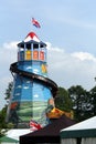 Guildford, England - May 28 2018: Traditional old fashioned vintage Helter Skelter fairground slide on a summer day Royalty Free Stock Photo