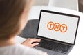 Woman with laptop - TNT logo