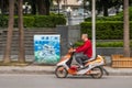 Man rides Olong scooter, Guilin, China Royalty Free Stock Photo