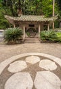 Pavilion with circular doorway to stairway in 7 Star Park, Guilin, China