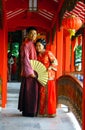 GUILIN, CHINA - NOV 4, 2007: Young couple in traditional Chinese costumes