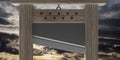 Guillotine against cloudy sky background. 3d illustration