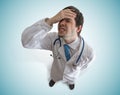 Guilt stressed and disappointed doctor. View from top Royalty Free Stock Photo