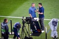 GUIMARAES, PORTUGAL - June 05, 2019: Journalist with microphone interview during the UEFA Nations League semi Finals match between