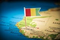 Guinea Belgium marked with a flag on the map