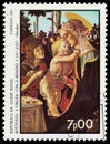 Stamp printed in Guinea-Bissau shows Madonna of the Rose Garden
