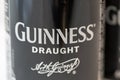 Guiness draught beer can closeup against white