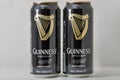 Guiness draught beer cans closeup against white