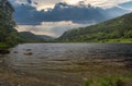 Guiness Lake, Glendalough, Wicklow Mountain, Ireland, at Sunny and cloudy Day
