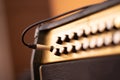 Guitar amplifier on bokeh light colored background, classic vintage rock sound. DSL20c tube amp Royalty Free Stock Photo