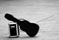 Guitar with amplifier isolated abandoned Royalty Free Stock Photo