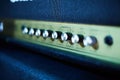 Guitar amplifier, level knobs closeup shot. Electric guitar amp closeup photo for rock music.