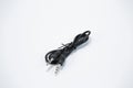 Guitar audio jack with black cable isolated on white background Royalty Free Stock Photo