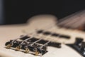 Close-up detail of bass guitar body on blurred background Royalty Free Stock Photo