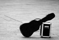 guitar case and a concert amplifier with black and white toned Royalty Free Stock Photo