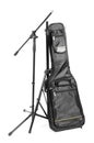 Guitar case and stand for microphone isolated on the white background Royalty Free Stock Photo