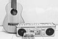 Guitar and cassette player Royalty Free Stock Photo