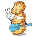 With guitar cellentani pasta in the character shape