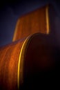 Guitar curves in shadow Royalty Free Stock Photo
