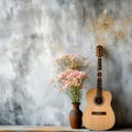 Guitar with flowers on light background Royalty Free Stock Photo