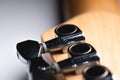 Guitar fretboard with tuning pegs and strings on a gray background. Close-up Royalty Free Stock Photo