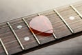 Guitar frets with mediator on strings Royalty Free Stock Photo