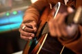 Guitar, hands and man in a studio with a closeup for production with musician and creativity. Artist, playing and Royalty Free Stock Photo