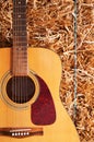 Guitar on a hay stack