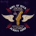 Guitar head and wings rock music emblem.