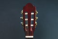 Guitar headstock close up. acoustic musical instrument